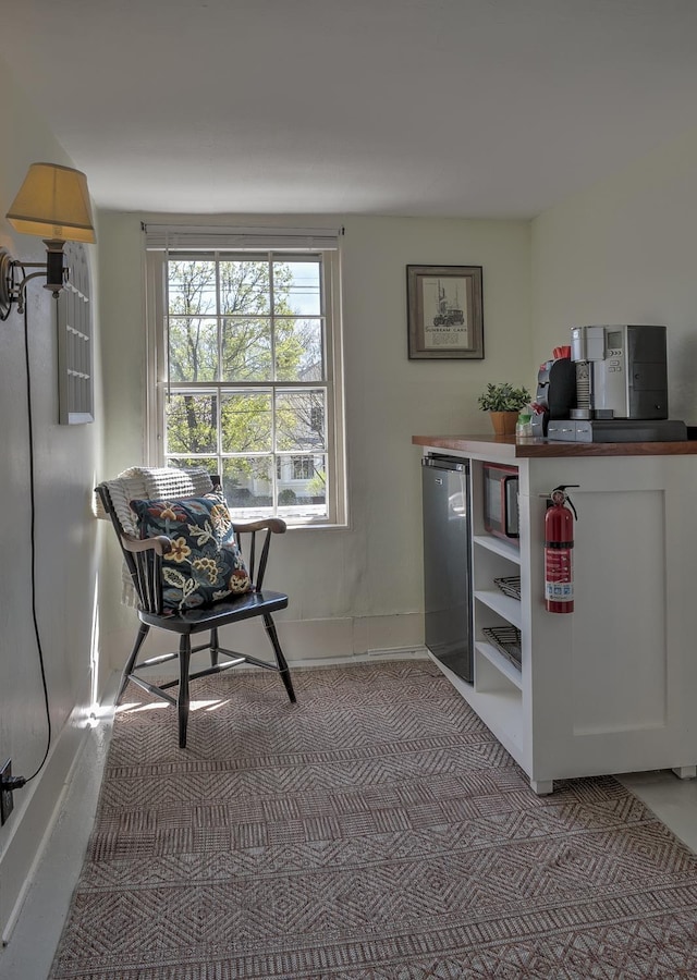 interior space featuring baseboards