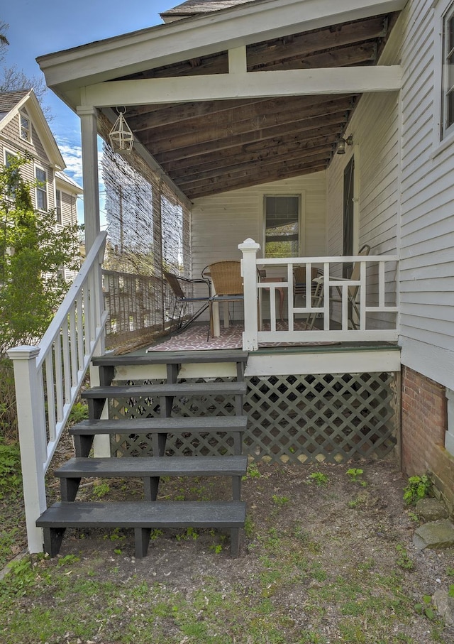 wooden terrace featuring a porch