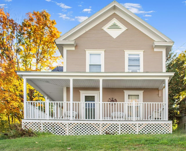19 Orchard St, Newport City, VT 05855 - back of property featuring covered porch and a lawn
