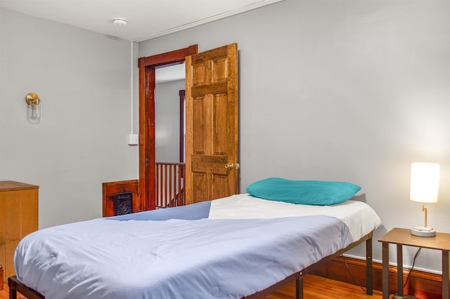 19 Orchard St, Newport City, VT 05855 - bedroom featuring wood finished floors