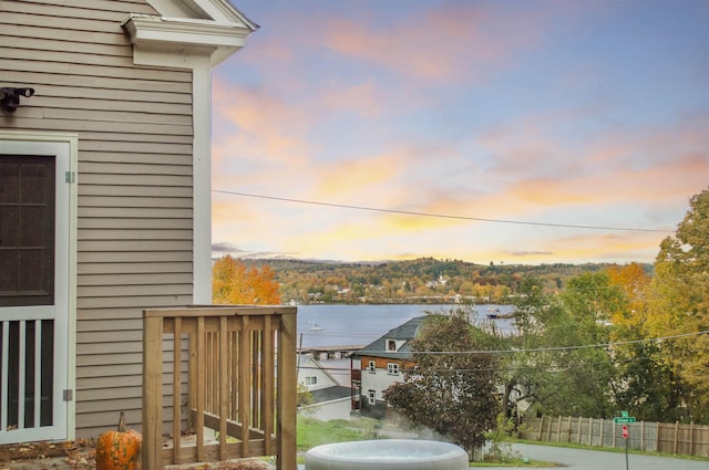 19 Orchard St, Newport City, VT 05855 - view of balcony at dusk