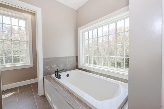 31 Shetland Rd, Chester, NH 03036 - full bathroom with plenty of natural light, tile patterned floors, baseboards, and a bath