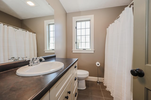 31 Shetland Rd, Chester, NH 03036 - bathroom featuring toilet, tile patterned floors, a wealth of natural light, and vanity