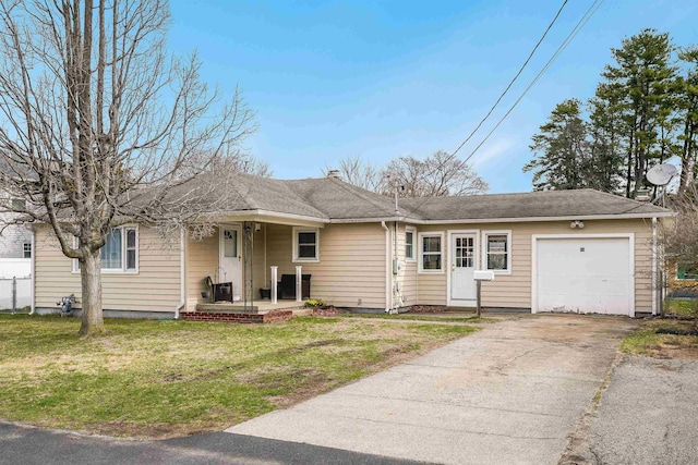 view of front of house with a garage, a porch, a front yard, a chimney, and concrete driveway