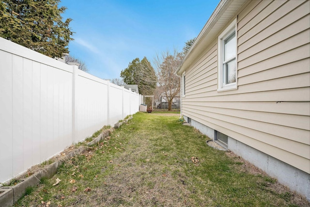 view of yard featuring fence