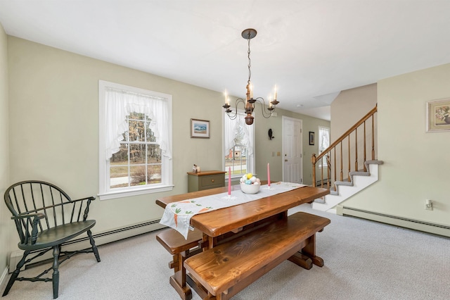 dining room with an inviting chandelier, a baseboard radiator, light carpet, and stairway