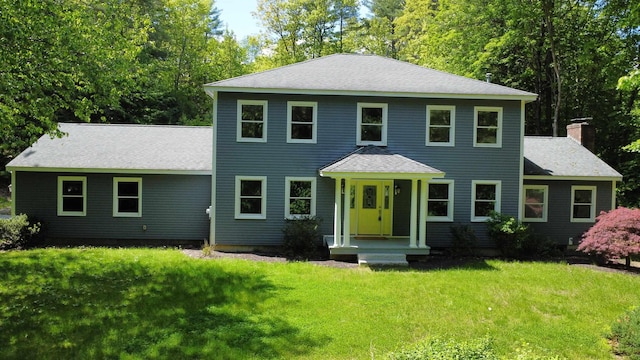 5 Sullivan Dr, Bow, NH 03304 - view of front of house with a front lawn and roof with shingles