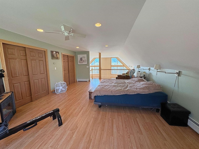 bedroom featuring ceiling fan, light wood finished floors, multiple closets, access to outside, and recessed lighting