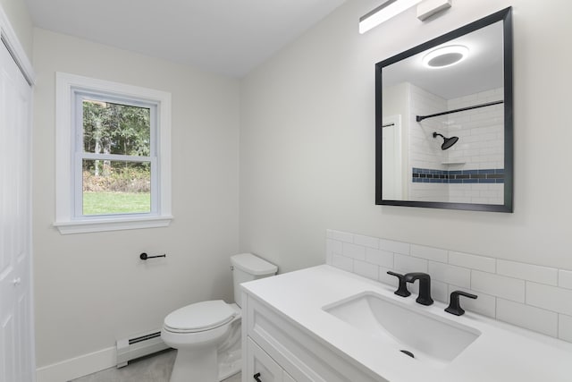 full bathroom featuring tasteful backsplash, walk in shower, vanity, a baseboard heating unit, and toilet