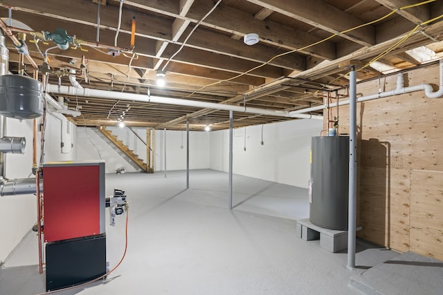 unfinished basement with water heater and stairs