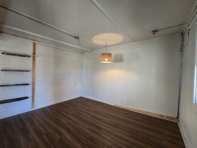empty room featuring wood finished floors