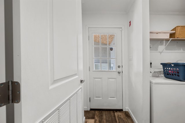 entryway with washer / dryer, crown molding, and dark wood finished floors