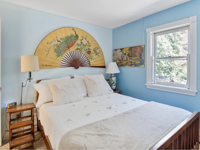 bedroom featuring multiple windows