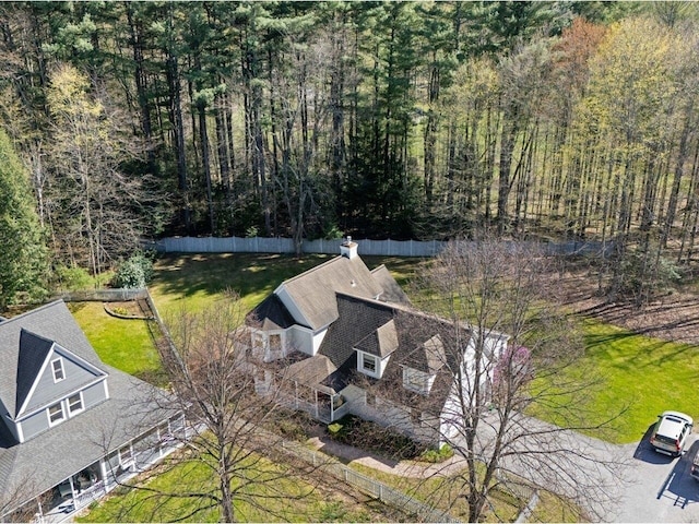 drone / aerial view featuring a view of trees