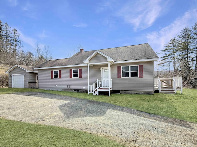 ranch-style house with driveway, a chimney, roof with shingles, and a front lawn