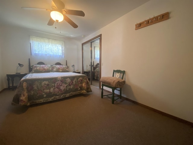 carpeted bedroom featuring ceiling fan, baseboards, and a closet