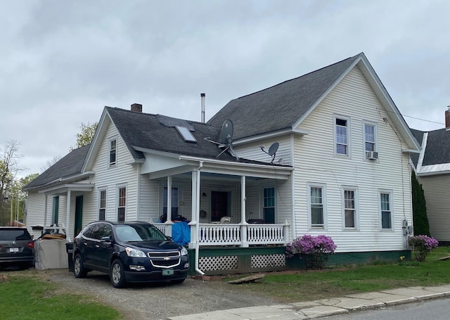 32 Myrtle St, Springfield, VT 05156 - view of property exterior featuring a porch, roof with shingles, and a chimney