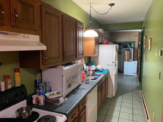 32 Myrtle St, Springfield, VT 05156 - kitchen with white appliances, light tile patterned floors, baseboard heating, a sink, and under cabinet range hood