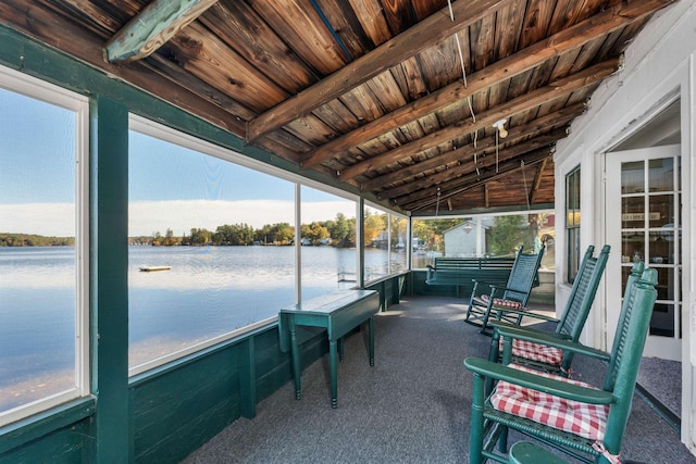 exterior space with a water view