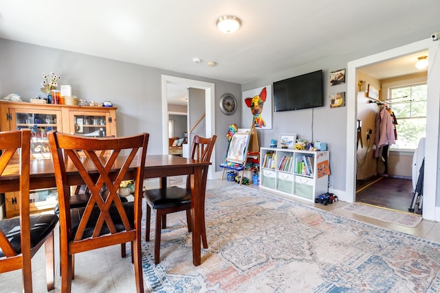 dining area with tile patterned floors