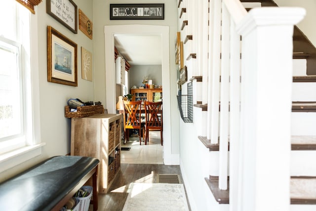 hallway with wood finished floors