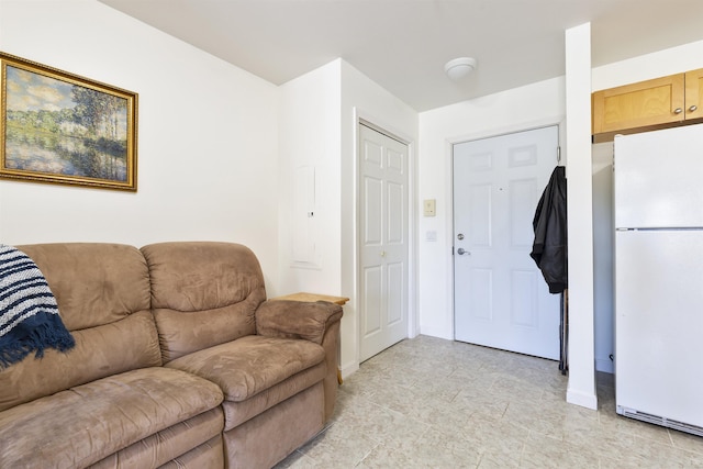 living room featuring baseboards