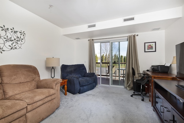 carpeted living room with visible vents
