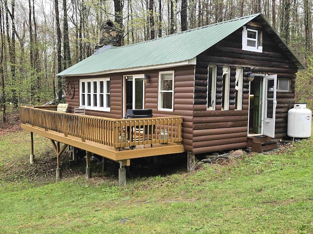 exterior space featuring a forest view