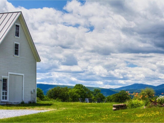 exterior space featuring a mountain view