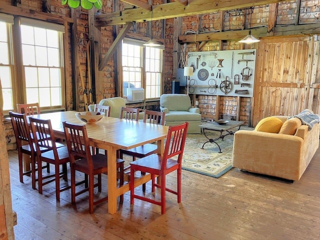 dining space featuring hardwood / wood-style flooring