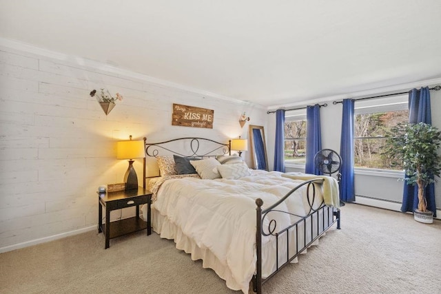 bedroom featuring baseboards, ornamental molding, baseboard heating, and light carpet