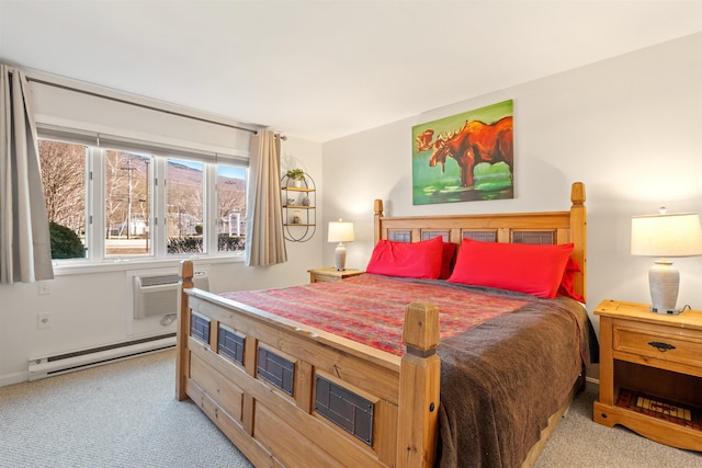 bedroom with baseboards, a baseboard radiator, a wall unit AC, and carpet flooring