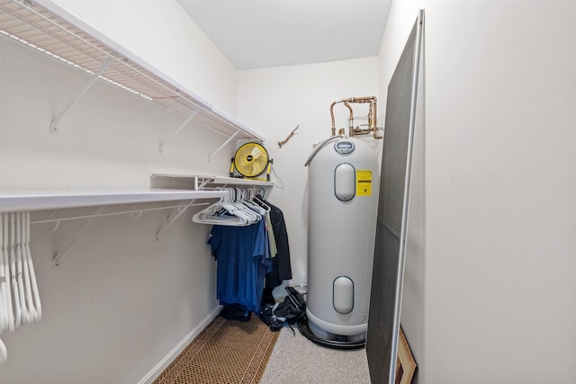 spacious closet featuring water heater