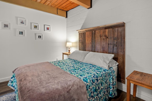 bedroom featuring wood ceiling and wood finished floors