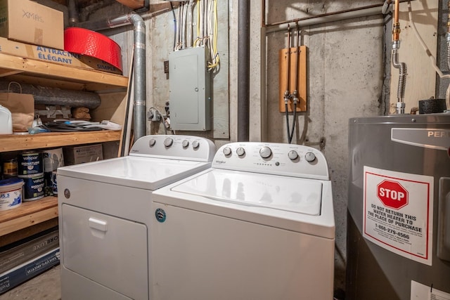 laundry room featuring laundry area, water heater, independent washer and dryer, and electric panel