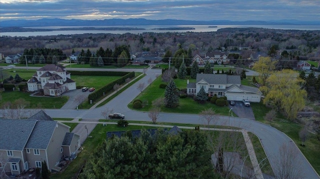 aerial view featuring a residential view and a water view