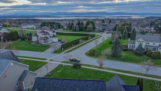 drone / aerial view with a residential view and a mountain view