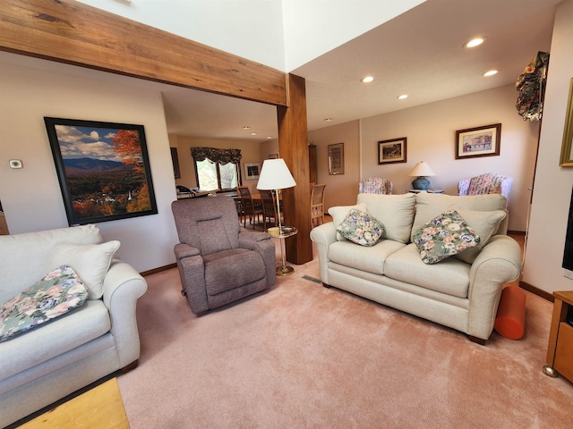living room with recessed lighting, baseboards, and carpet