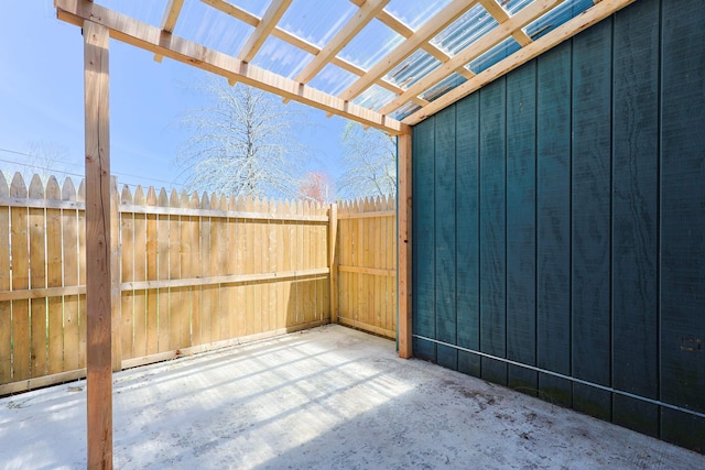 view of patio / terrace featuring fence