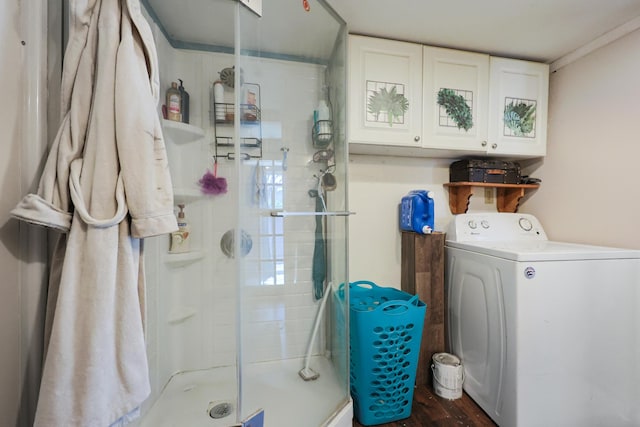 interior space with cabinet space, washer / dryer, and dark wood-style floors
