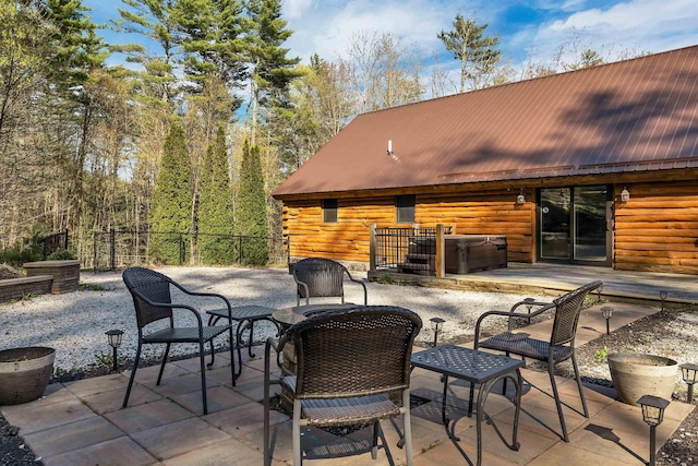 view of patio featuring fence