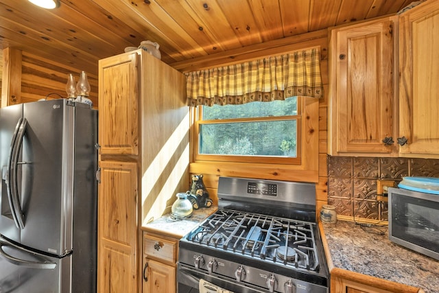 kitchen with wood ceiling, appliances with stainless steel finishes, and tasteful backsplash