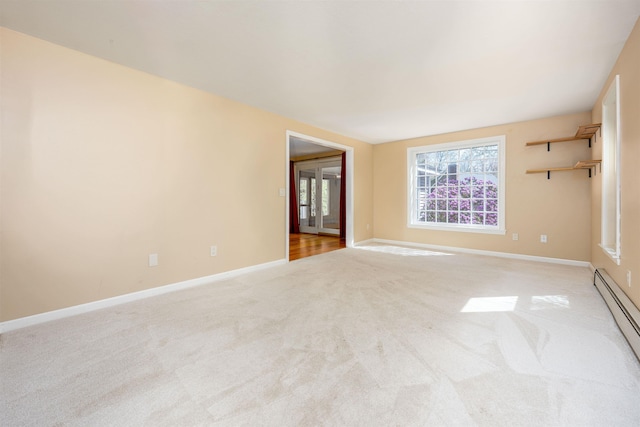 unfurnished room with baseboards, light colored carpet, and a baseboard radiator