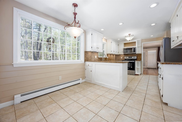 kitchen featuring open shelves, a peninsula, baseboard heating, white cabinets, and appliances with stainless steel finishes