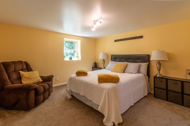 bedroom featuring light colored carpet