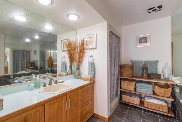 full bath featuring vanity, tile patterned flooring, and a shower with curtain