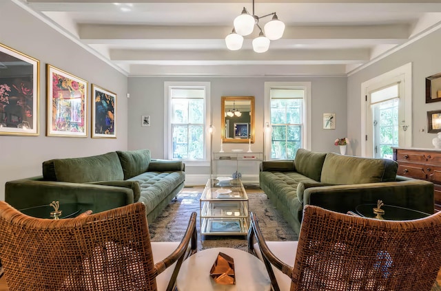 sitting room with an inviting chandelier, a wealth of natural light, and beamed ceiling