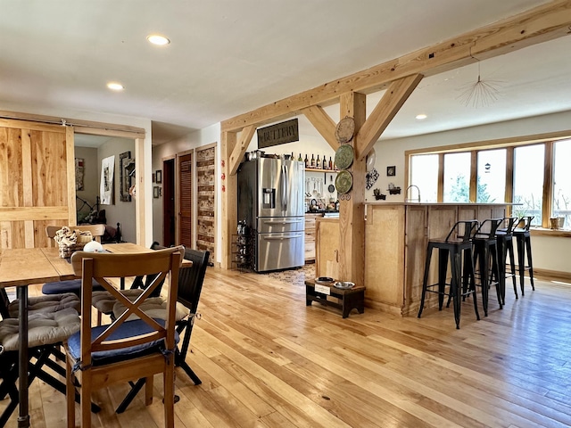 dining area featuring recessed lighting and light wood-type flooring