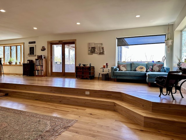 living room featuring recessed lighting and hardwood / wood-style flooring