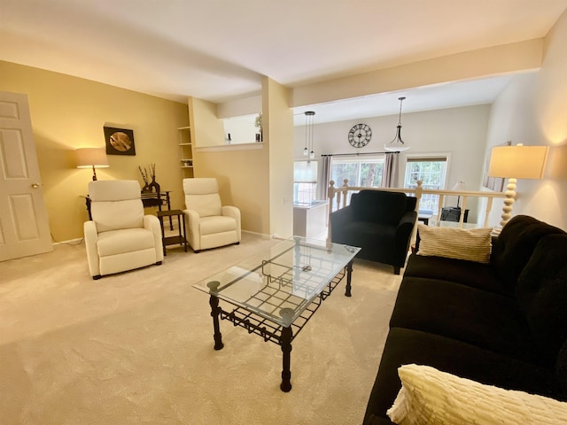 living room with light colored carpet